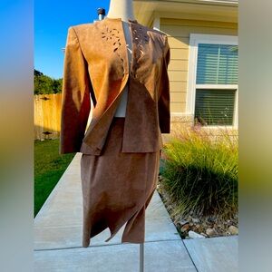 Fabulous Ultrasuede, which is a faux suede suit size 14, but check measurements.